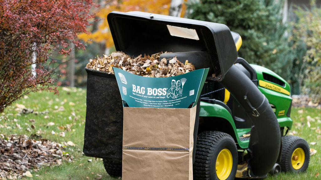 Bag Boss being used to clean up leaves